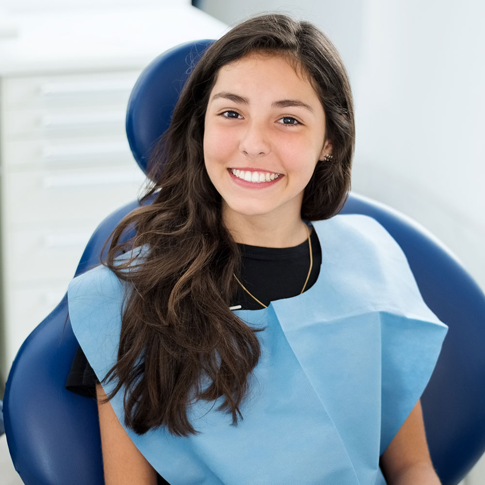 Dental patient after knocked-out tooth emergency in Downey