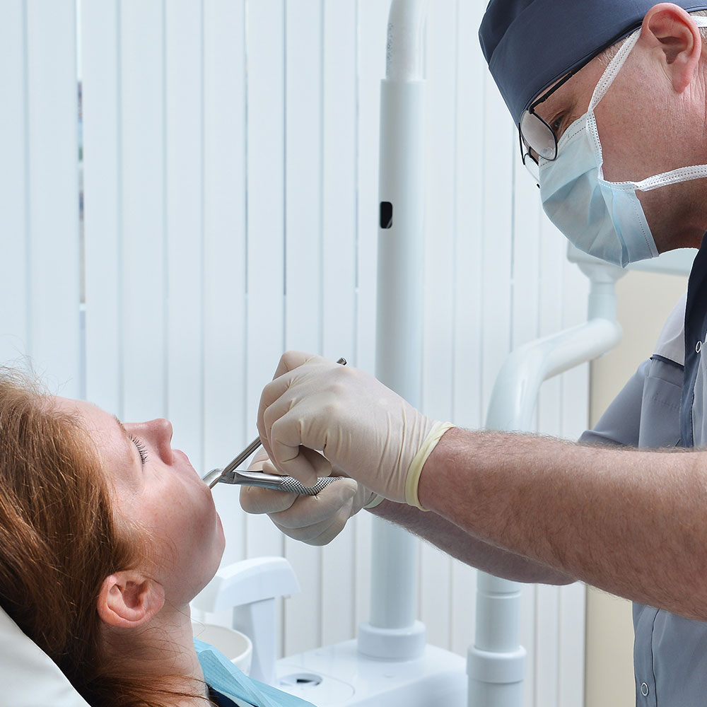 Emergency exam for knocked-out tooth in Downey